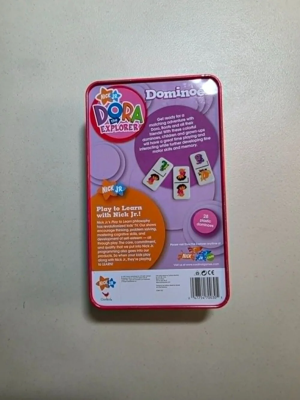 Nick Jr. Dora the Explorer Dominoes Game in Collectible Tin – 28 Plastic Pieces